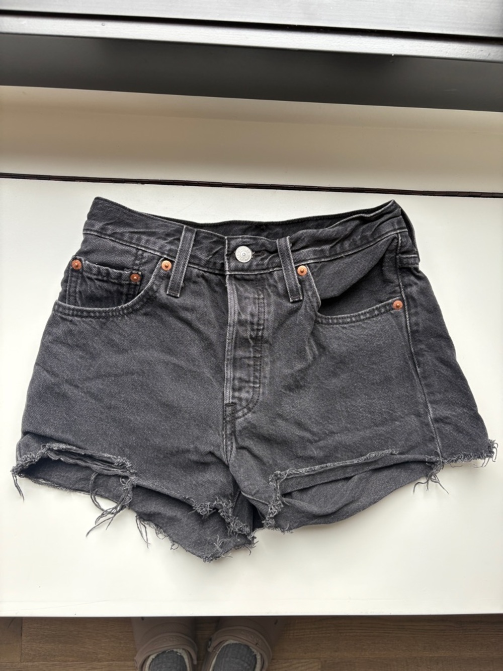 Levi’s 501 High-Rise Black Distressed Denim Shorts